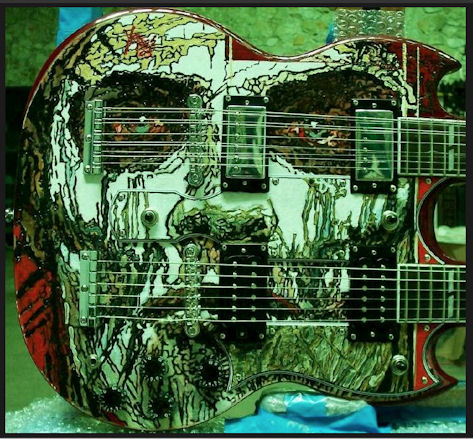 11_mejores_portadas_65_los_lobos_George Yepes - Shotgun Messenger (Custom Double-neck Gibson Guitar - Robert Rodriguez Collection)  2006